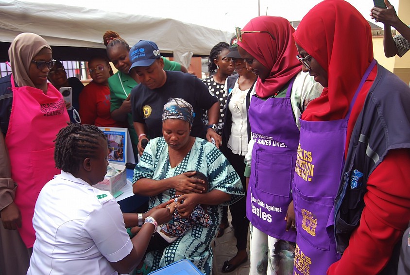 A child receiving measles vaccination